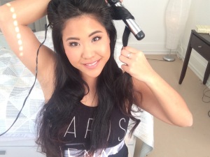 Using a 1 inch curling iron or wand, wrap chunks of hair around the iron in random directions., leaving the ends loose.
